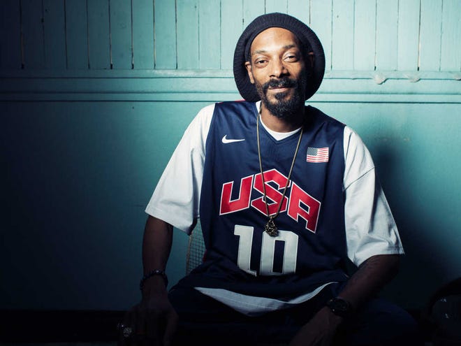 Snoop Dogg, who now goes by Snoop Lion, poses for a portrait at Miss Lily's in New York.