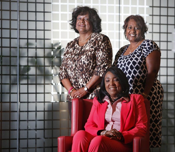 From left, Sharon Bridges, Darlene Matthews and Judy Cunningham are learning to be community health advisers to assist women who are uninsured or underinsured, have little money or have poor access to care.