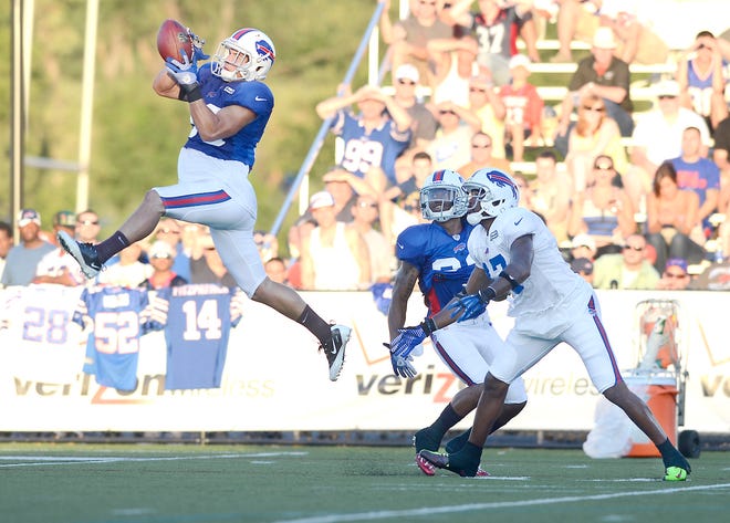 Safety, Nick Saenz (30) catches the ball in mid flight at Buffalo Bills training camp at St. John Fisher College.