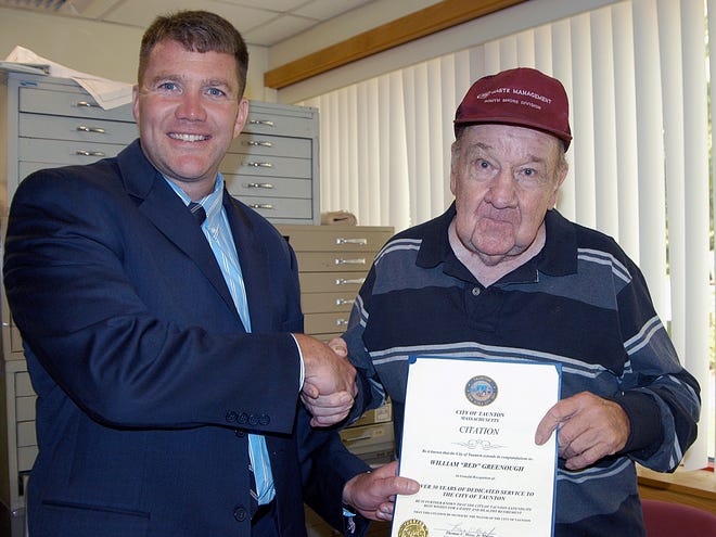 Mayor Thomas Hoye Jr. presents a citation in recognition of the 30-plus-year career of DPW employee William "Red" Greenough.
