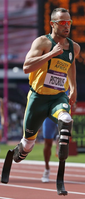 South Africa's Oscar Pistorius competes in a men's 400-meter heat during the athletics in the Olympic Stadium at the 2012 Summer Olympics, London, Saturday, Aug. 4, 2012. (AP Photo/Matt Dunham)