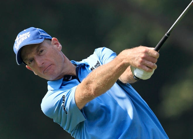 Jim Furyk tees off on the third hole during the second round of the Bridgestone Invitational golf tournament at Firestone Country Club, Friday, Aug. 3, 2012, in Akron, Ohio. (AP Photo/Tony Dejak)