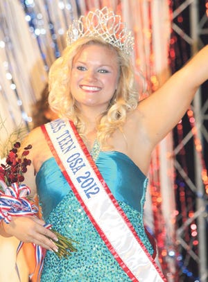 Jenna Loudenburg of Bradford waves to the crowd as she takes her first walk across the stage after being crowned the new 2012 Miss Teen OSA on Thursday.