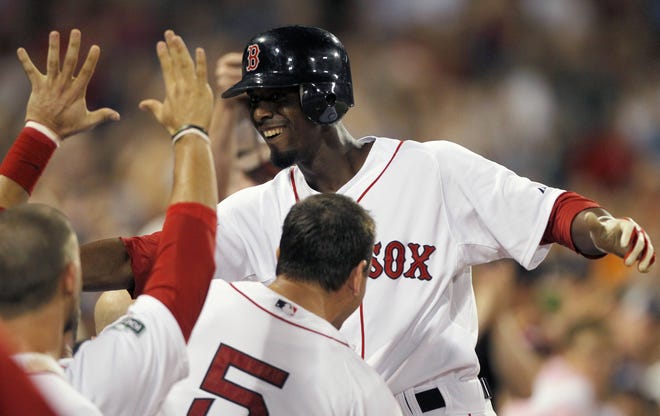 Boston Red Sox's Pedro Ciriaco, top right, celebrates his first career major league home run in the eighth inning of a baseball game against the Minnesota Twins in Boston, Saturday, Aug. 4, 2012.