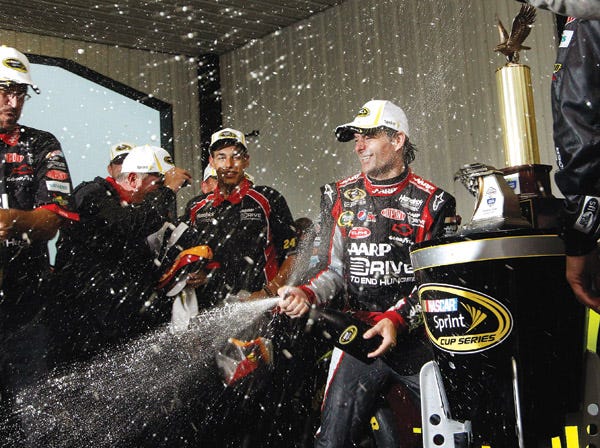 Jeff Gordon celebrates winning Sunday’s race at Pocono.
(Mel Evans | Associated Press)