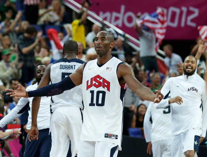 USA's Kobe Bryant celebrates a 3-pointer against Australia during a men's quarterfinals basketball game at the 2012 Summer Olympics, Wednesday, Aug. 8, 2012, in London. (AP Photo/Charles Krupa)