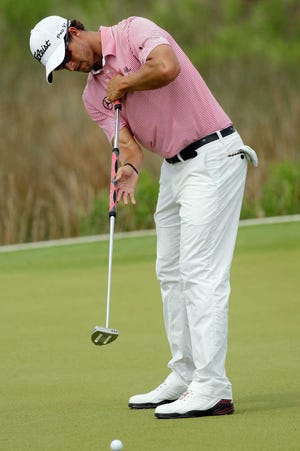 Adam Scott of Australia, putts on the 12th green during a practice round for the PGA Championship golf tournament on the Ocean Course of the Kiawah Island Golf Resort in Kiawah Island, S.C., Wednesday, Aug. 8, 2012. (AP Photo/Chuck Burton)