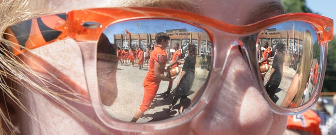 IndeOnline.com / Glenn B. Dettman
Massillon Tiger photo day as reflected in tiger sunglasses.