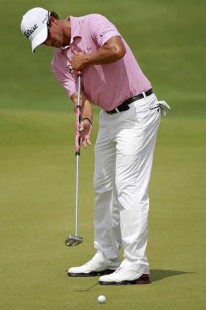 Adam Scott putts Wednesday during a practice round for the PGA Championship.