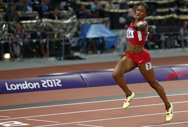 Matt Dunham Associated Press USA's Carmelita Jeter heads to the finish line in the women's 4x100-meter relay final to win gold on Friday at the 2012 Olympics in London. The U.S. team set a new world record with a time of 40.82 seconds.