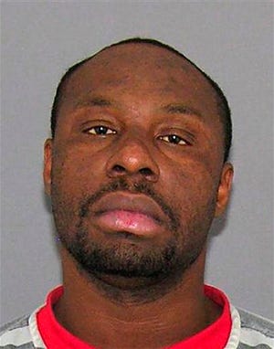This undated file photo provided by the Hamilton County Sheriff's Department shows Ricardo Woods, who is charged in the 2010 fatal shooting of a man in Cincinnati. An Ohio jury will study a videotape of the dying victimís eye blinks before deciding whether he used them to identify Woods as his killer. A hearing Monday, Aug. 13, 2012, could determine the trial date. (AP Photo/Hamilton County Sheriff's Department, File)