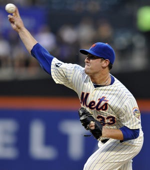 New York pitcher and 2007 Fitch graduate Matt Harvey throws Friday during the first inning against Atlanta.