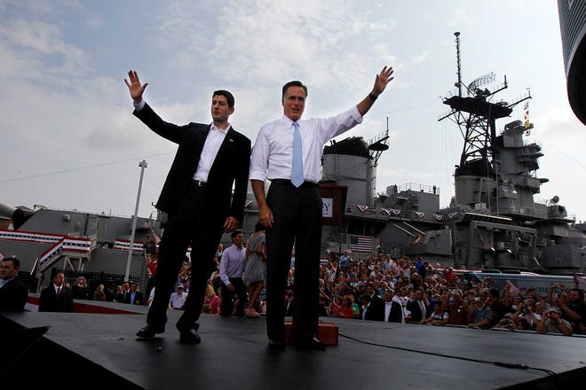 Republican presidential candidate Mitt Romney, right, with his newly announced vice presidential running mate, Rep. Paul Ryan, R-Wis., during a campaign rally in Manassas, Va., on Saturday, Aug. 11, 2012.