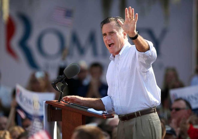 Daron Dean St. Augustine Record Republican presidential candidate Mitt Romney is surrounded by listeners Monday as he speaks at Flagler College in St. Augustine, the site of the first stop of his Florida campaign tour.
