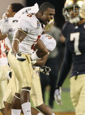 Florida State cornerback Greg Reid celebrates at the conclusion of the Champs Sports Bowl game against Notre Dame at the Florida Citrus Bowl in Orlando, Florida, on Thursday, December 29, 2011. Florida State won, 18-14. (Stephen M. Dowell/Orlando Sentinel/MCT)