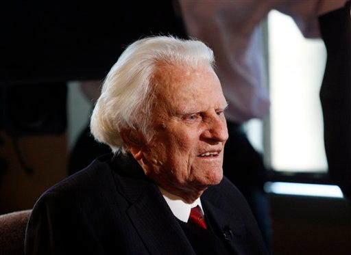 In this Dec. 20, 2010 file photo, evangelist Billy Graham speaks to the media at the Billy Graham Evangelistic Association headquarters in Charlotte, N.C. A spokesman for Graham says the 93-year-old evangelist has been admitted to a North Carolina hospital for an infection in his lungs.