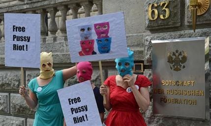 Masked female activists demonstrate in support of members of the feminist punk group Pussy Riot in front of the Russian Embassy in Berlin, Germany, Thursday Aug. 9, 2012. Prosecutors in Russia on Tuesday called for three-year prison sentences for feminist punk rockers who gave an impromptu performance in Moscow's main cathedral to call for an end to Vladimir Putin's rule, in a case that has caused international outrage and split Russian society.