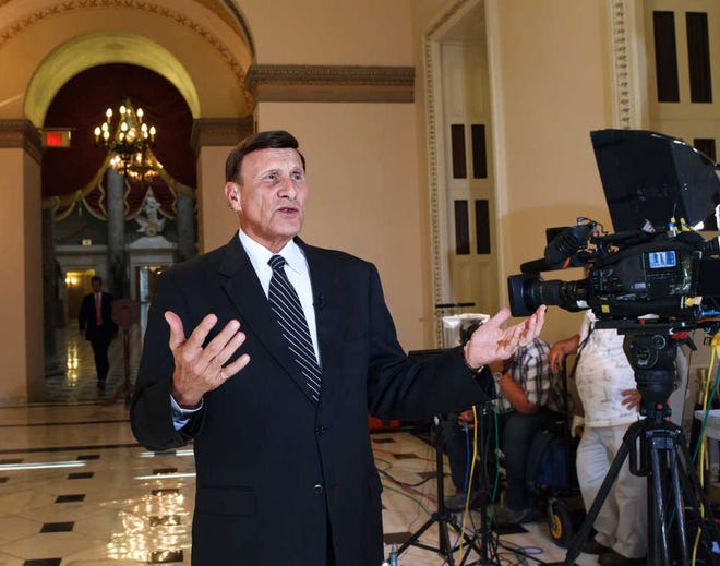In this photo taken Aug. 1, 2012, House Transportation Committee Chairman Rep. John Mica, R-Fla., speaks during a TV news interview on Capitol Hill in Washington. (AP Photo/J. Scott Applewhite)