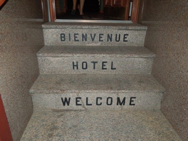 The steps to Marisa's Quebec hotel were equally welcoming in French and English.