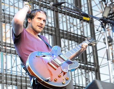 This June 5, 2010 file photo shows Brian Aubert of Silversun Pickups performing at The 2010 KROQ Weenie Roast at The Verizon Wireless Amphitheater in Irvine, Calif. The Silversun Pickups want Mitt Romney's presidential campaign to immediately stop the use of the rock group's song "Panic Switch." And the Romney campaign has no problem with that. The Los Angeles-based band's attorney sent a cease and desist letter to the Republican presidential candidate's campaign on Wednesday. A news release says neither the band nor its representatives were contacted for permission to use the 2009 alternative rock hit and the group "has no intention of endorsing the Romney campaign." (AP Photo/Katy Winn, file)