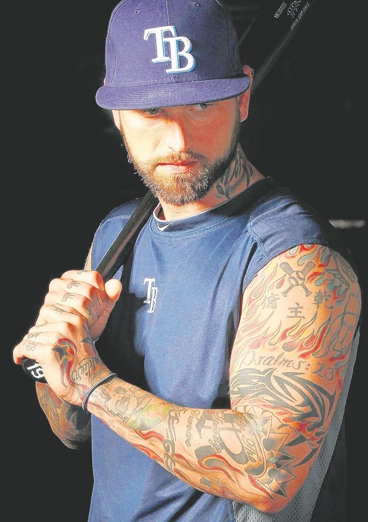 Do any MLB pitchers have tattoos on their pitching arms  Quora