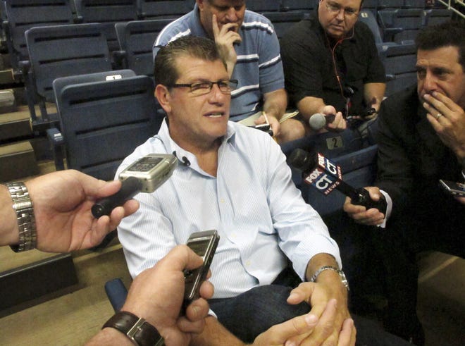 Connecticut women's basketball coach Geno Auriemma speaks with reporters at Gampel Pavilion, in Storrs, Conn., Thursday, Aug. 16, 2012. Auriemma said he has no interest in returning in 2016 as coach of the U.S. Olympic women's basketball team.