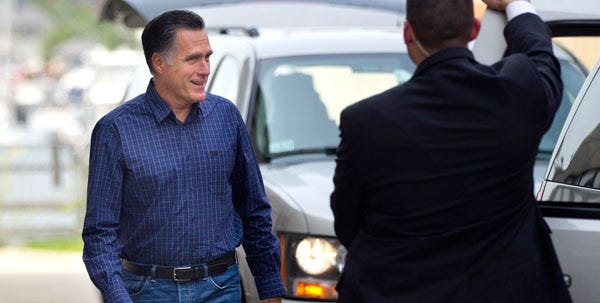 Republican presidential candidate Mitt Romney leaves his headquarters Friday in Boston. He'll be visiting the Cape and Islands today for fundraising events.