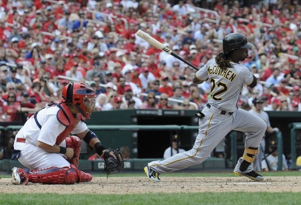Pittsburgh Pirates' Andrew McCutchen (22) hits a one-run single which scored Jeff Karstens during the sixth inning of a baseball game against the St. Louis Cardinals, Sunday, Aug. 19, 2012, in St. Louis. (AP Photo/Jeff Curry)