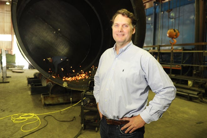 MassTank Sales Corp. owner Carl C. Horstmann, shown on Tuesday, July 17, 2012, has expanded the products his company makes from steel tanks to portable gas stations, barges and wind-power projects.