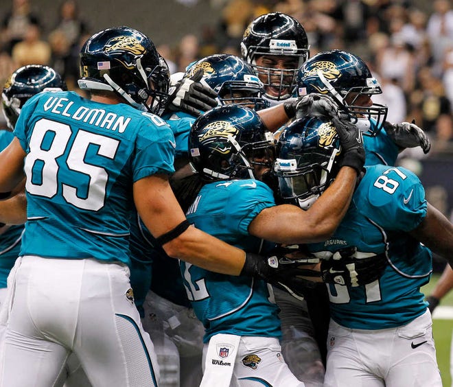 Jacksonville Jaguars wide receiver Kevin Elliott (87) celebrates with teammates after scoring Friday during the second half of a preseason game against the New Orleans Saints The Jaguars won 27-24.