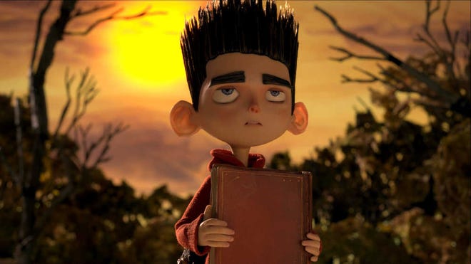 This film image released by Focus Features shows the character Norman, voiced by Kodi Smit-McPhee, in the 3D stop-motion film, "ParaNorman." (AP Photo/Focus Features)