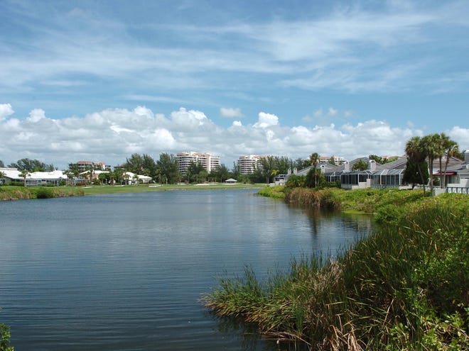 Arvida developed the Islandside section of the Longboat Key Club, which includes Bay Isles, in the 1970s through the 1990s. A large lagoon adds to the scenery of the master-planned development. STAFF PHOTO / HAROLD BUBIL