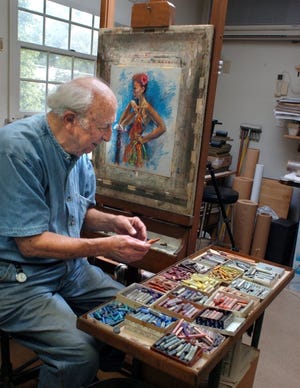 Artist Ben Cohen looks over boxes and boxes of pastels, as he works on an untitled piece at his home studio in Cinnaminson. Cohen has an upcoming show at the Home Fine Art Gallery, 2 Church Street in Mount Holly.