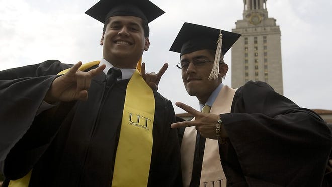 The University of Texas is among the nation's largest public universities. Among its May graduates were brothers Adan, left, and Ivan Medina.