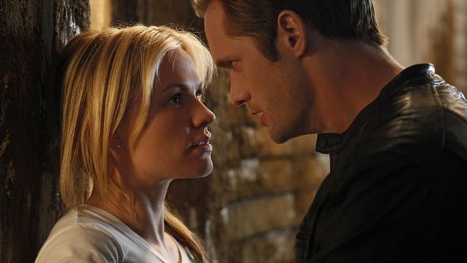 Sookie (Anna Paquin, left) and Eric (Alexander Skarsgard) get personal in Season 3 of 'True Blood.'