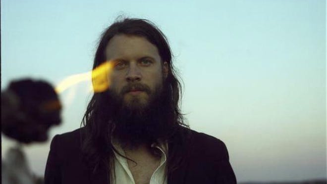 Josh Tillman says criticism of his work as 'unhappy' is off the mark. 'It's very joyful to me to get down to the bone and marrow of what seem like negative experiences.'