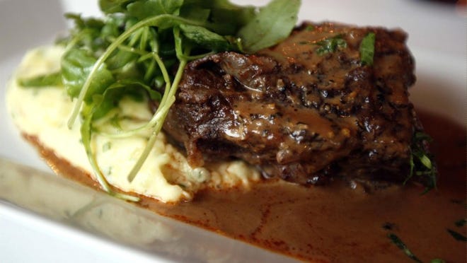 At Braise, the osso bucco is served with mashed potatoes.