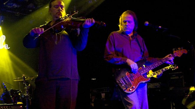 My Education's ethereal score for 'Sunrise' has 'made a couple of people cry. And I'm very proud of that,' says bassist Scott Telles, right, performing with James Alexander at a My Education show.