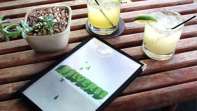 The Malverde margarita, left, is capable of converting a frozen margarita drinker. The Passion Fruit and Spiced Mango margarita, however, wasn't as exotic as it sounds.