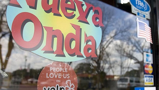 Some restaurants, such as Nueva Onda, embrace user critiques on Yelp.