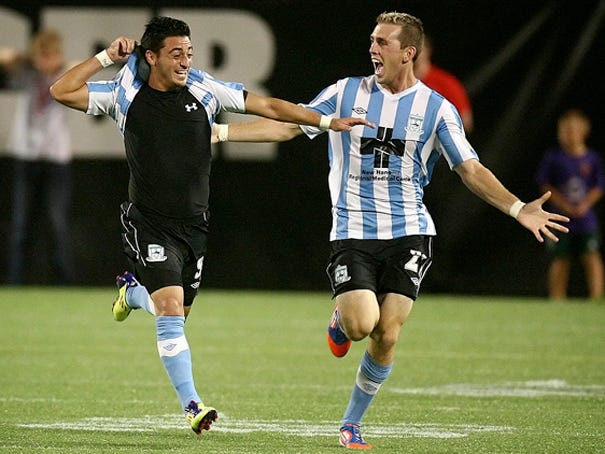 Hagop Chirishian, left, from Wilmington celebrates his goal with teammate Corey Hertzog during their game against Orlando City in their second-round USL Pro playoff match at the Citrus Bowl on August 31, 2012. (Jacob Langston/Orlando Sentinel)