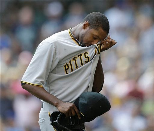 Pittsburgh Pirates starting pitcher James McDonald reacts after being removed against the Milwaukee Brewers during the third inning of a baseball game on Sunday, Sept. 2, 2012, in Milwaukee. (AP Photo/Jeffrey Phelps)