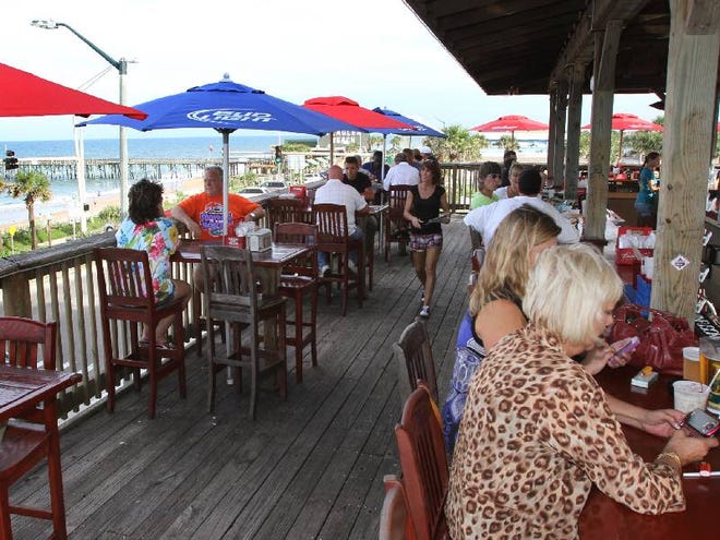 The deck at Finn’s in Flagler Beach is busy on a recent afternoon.