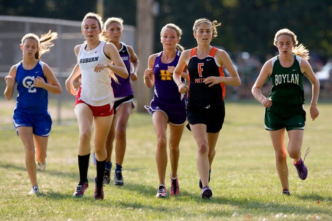 Runners in the girls varsity race (from left) Joy Hittenmiller of Christian Life, Auburn's Janelle Ferguson, Hononegah's Courtney Clayton, Freeport's Ellie Willging and Boylan's Deirdre Coyle lead the race near the halfway point Wednesday, Aug. 29, 2012, during the Ben Newson Invitational at Searls Park in Rockford.