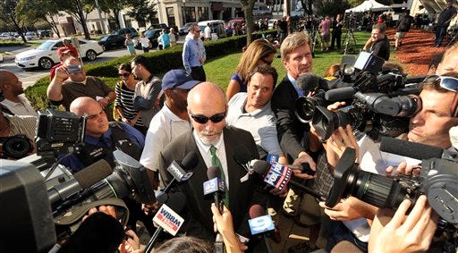 Joel Brodsky attorney for Former Bolingbrook police officer Drew Peterson, talks to the media outside the Will County Courthouse during the first day of jury deliberations in Peterson's murder trial, Wednesday, Sept. 5, 2012, in Joliet, Ill. The jury must wade through five weeks of circumstantial and hearsay evidence to decide wether the former police sergeant murdered his third wife Kathleen Savio. (AP Photo/Paul Beaty)