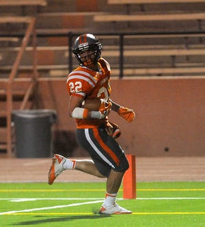 MICHAEL NORRIS / AMARILLO GLOBE-NEWS Caprock receiver Addison Bustos crosses the goal line for a touchdown in last week's season opener against Snyder at Dick Bivins Stadium. Bustos caught 14 passes for 308 yards and five touchdowns. Caprock plays at Borger on Friday night.