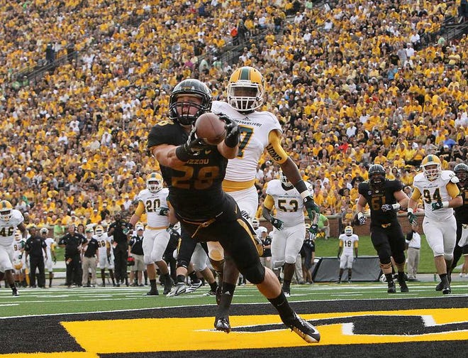 Missouri wide receiver T.J. Moe catches a two-yard touchdown pass in first quarter action during a game between Missouri and Southeastern Louisiana on Saturday, Sept. 1, 2012 at Faurot Field in Columbia, Mo. (AP Photo/Chris Lee, St. Louis Post-Dispatch)