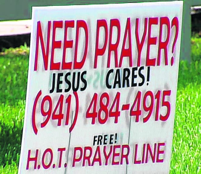 City of Venice Code Enforcement cited residents for having this religious 
sign in the front yard of a home on The Rialto. A religious group has 
threatened court action.