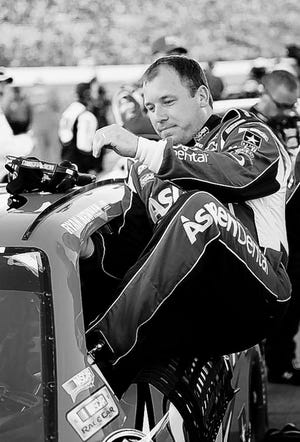 Ryan Newman climbs in his car before the NASCAR Sprint Cup Series auto race 
at Daytona International Speedway in July, in Daytona Beach. Newman 
confirmed that he has signed a contract extension with Stewart-Haas Racing 
for next season.ASSOCIATED PRESS