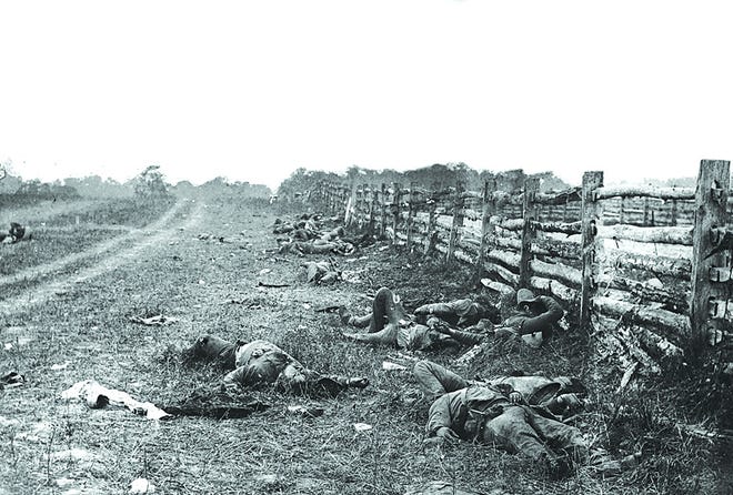 In this Library of Congress photograph, following the first day’s aftermath at the Battle of Antietam, Confederate soldiers lie dead along a fence on the road to Hagerstown, Antietam, Md., September 1862. Most of the first day’s fiercest fighting took place in a farmer’s cornfield near this road. The photograph was taken by Civil War photographer Alexander Gardner. "Pennsylvania at Antietam" will be discussed by a panel of Civil War historians at the Sept. 13 speakers meeting, beginning at 7 p.m. in the barn at Allison-Antrim Museum.